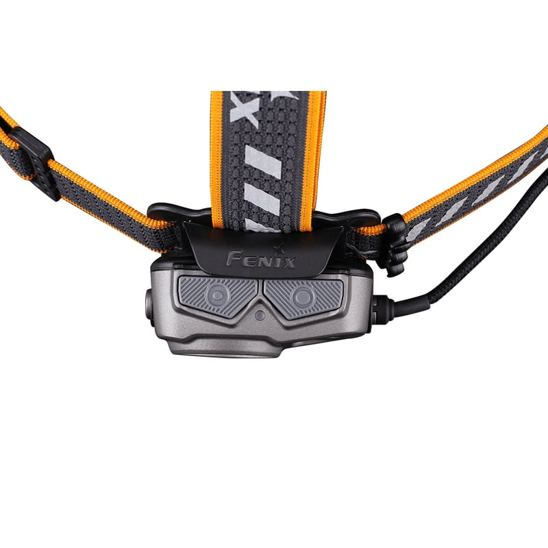Gros plan des LEDs double faisceau et du bouton caoutchouté de la lampe Fenix 1418424.