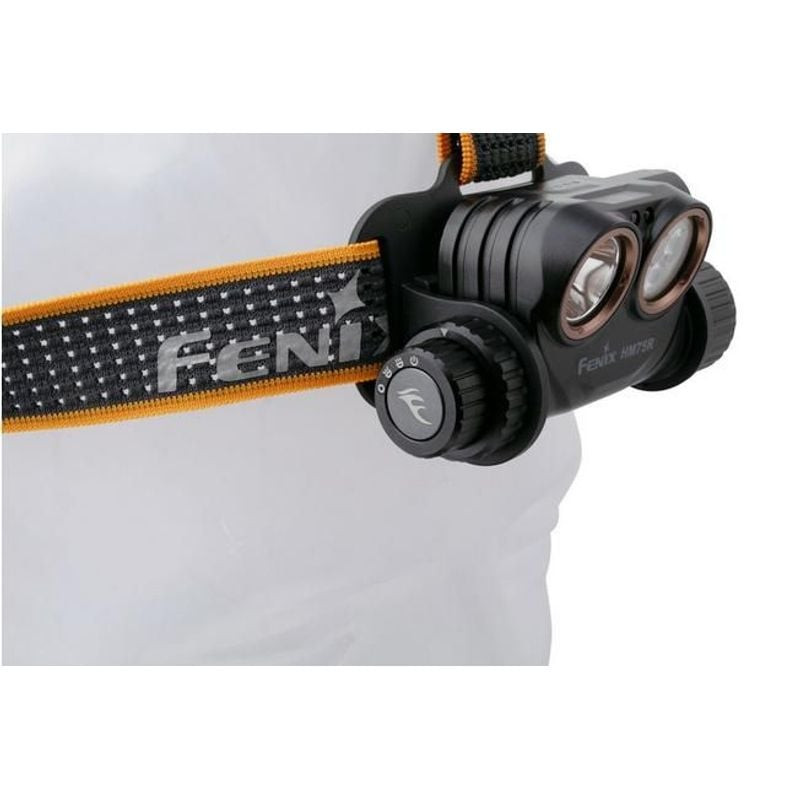 Gros plan sur l'interrupteur rotatif et le bouton de mode de la Fenix HM75R : projecteur, faisceau l