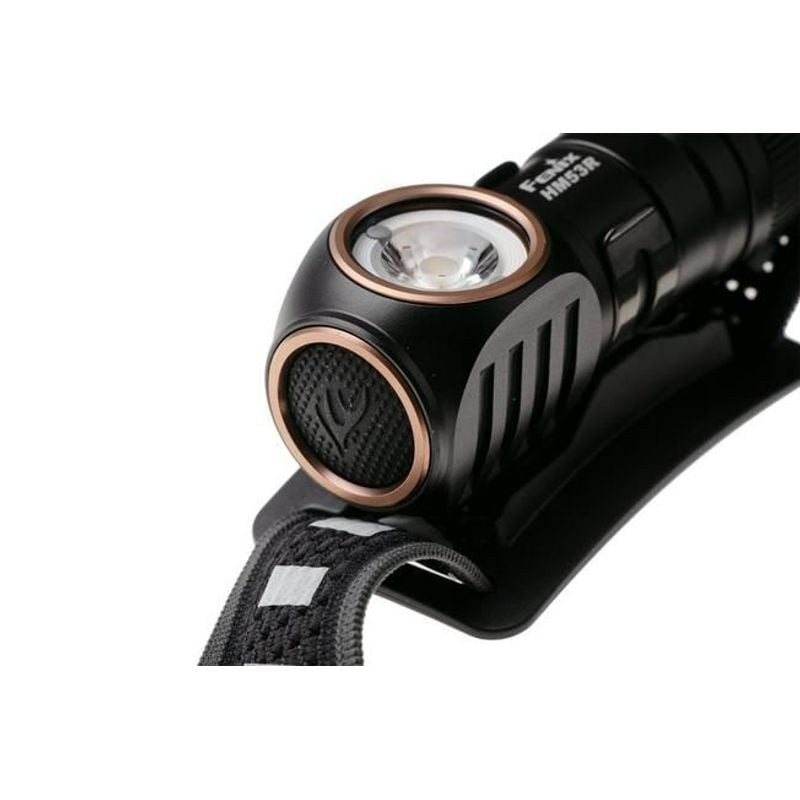 Détail du capuchon magnétique et du clip de poche de la Fenix HM53R pour des options de fixation pol