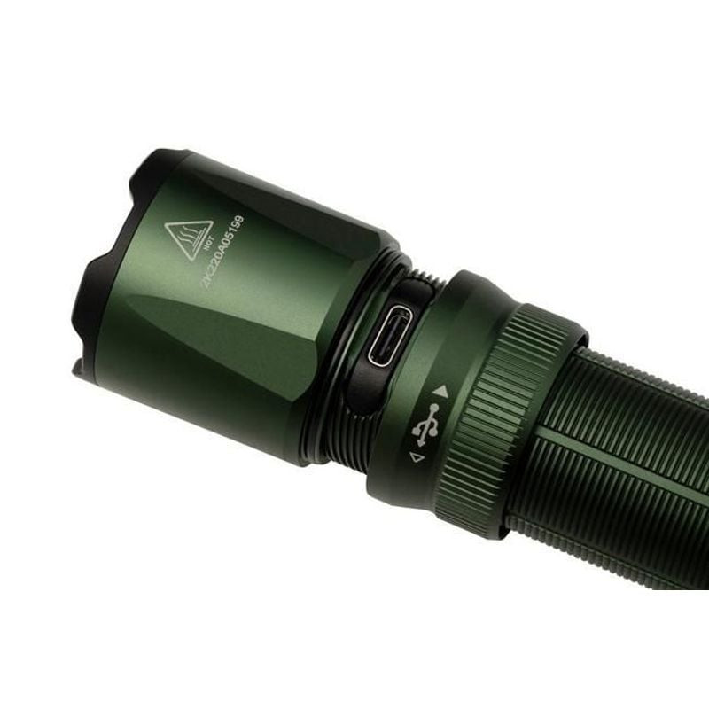 Gros plan du commutateur FlexiSensa breveté sur la lampe de poche Fenix TK20R UE Tropical.