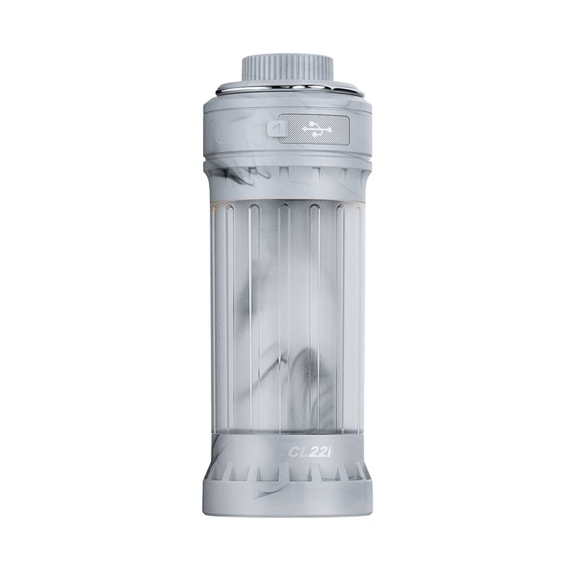 Lanterne rechargeable Fenix CL22R IW Iceberg White sur une surface en bois, montrant sa forme cylind
