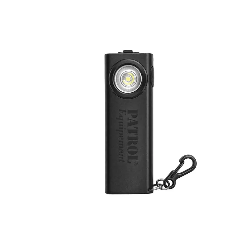 Lampe LED mini Patrol 1047974 vue de face sur fond blanc, lentille LED allumée, marquage Patrol et c